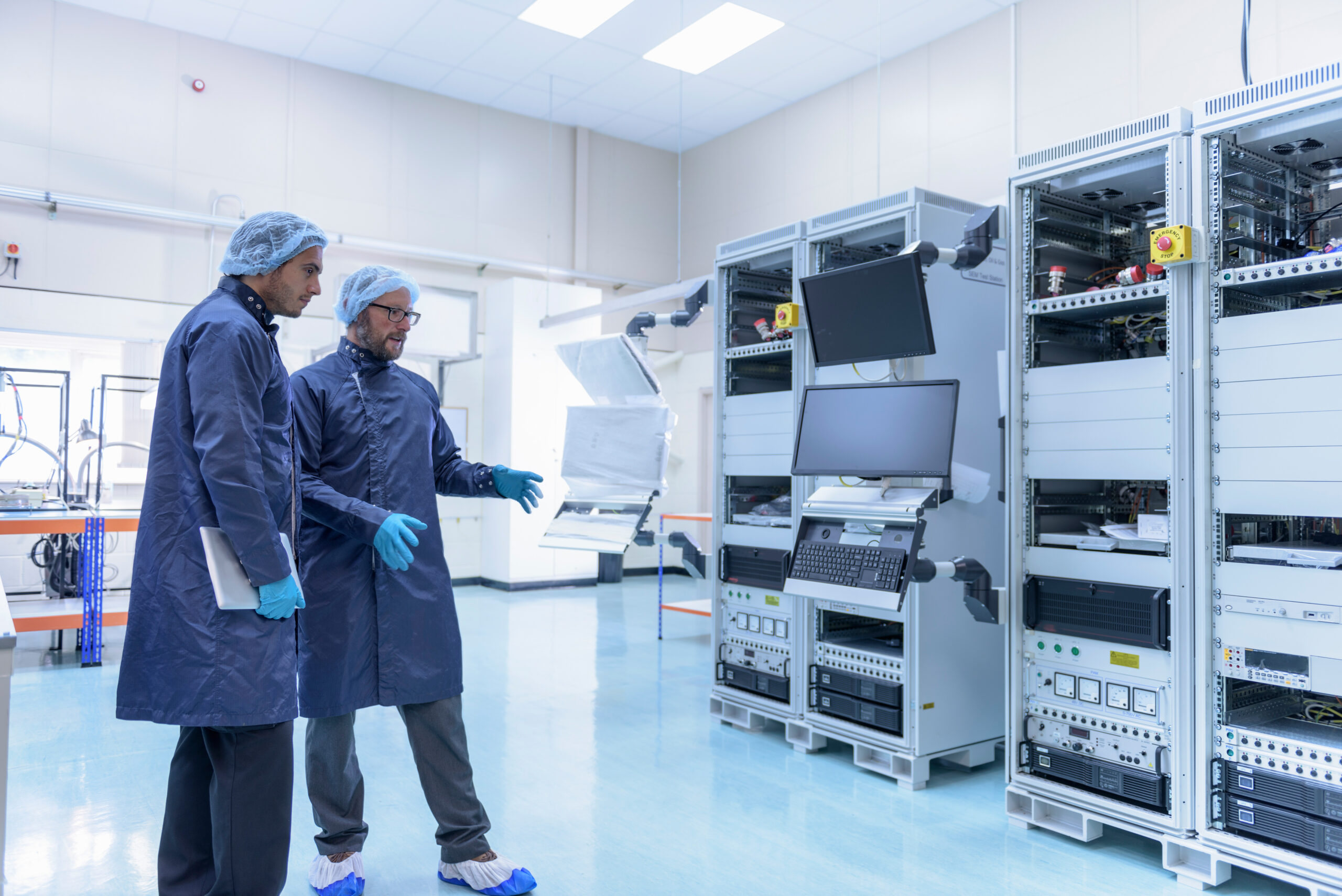 workers in clean room in electronics factory 2022 03 07 23 58 02 utc scaled 1